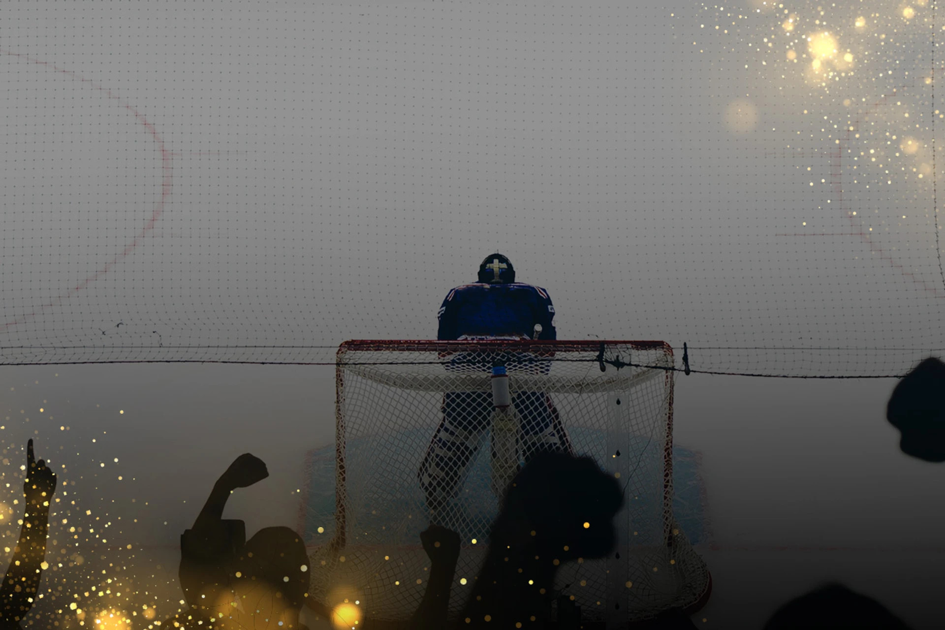 En ishockey målvakt står och vaktar ett ishockeymål under en match som spelas